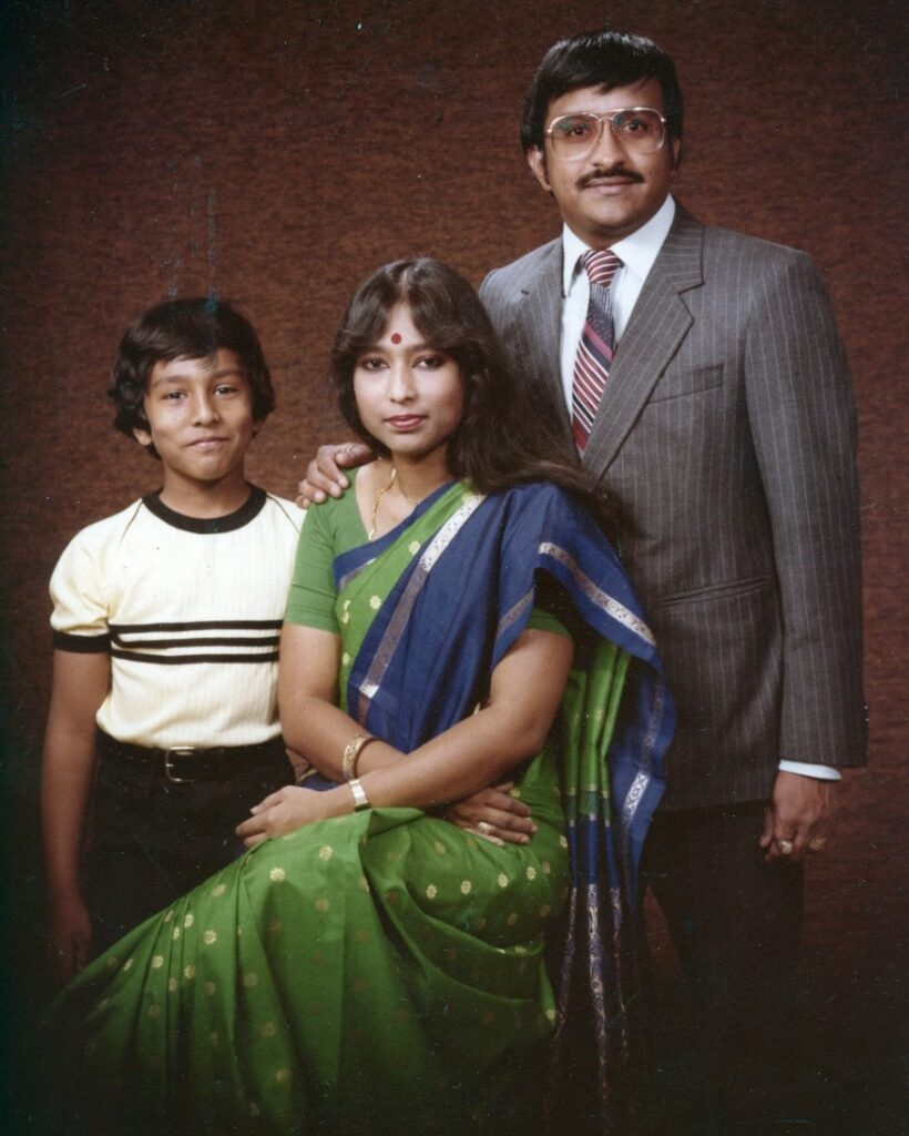Archival family portrait — a young Sanjay Srinivasan with his mother and father.